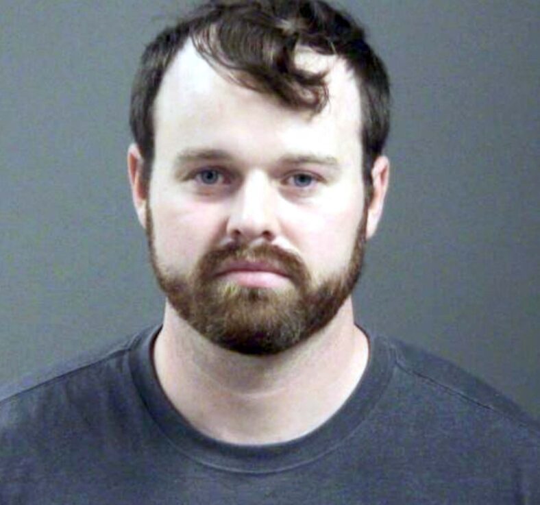 Joseph Duggar booking photo, a married father-of-four and the younger brother of convicted sex offender Josh Duggar was arrested on Wednesday in connection with allegations that he touched a nine-year-old girl on her underwear and genitals.
