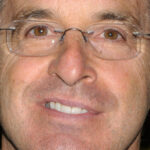 Robert Carradine smiling
