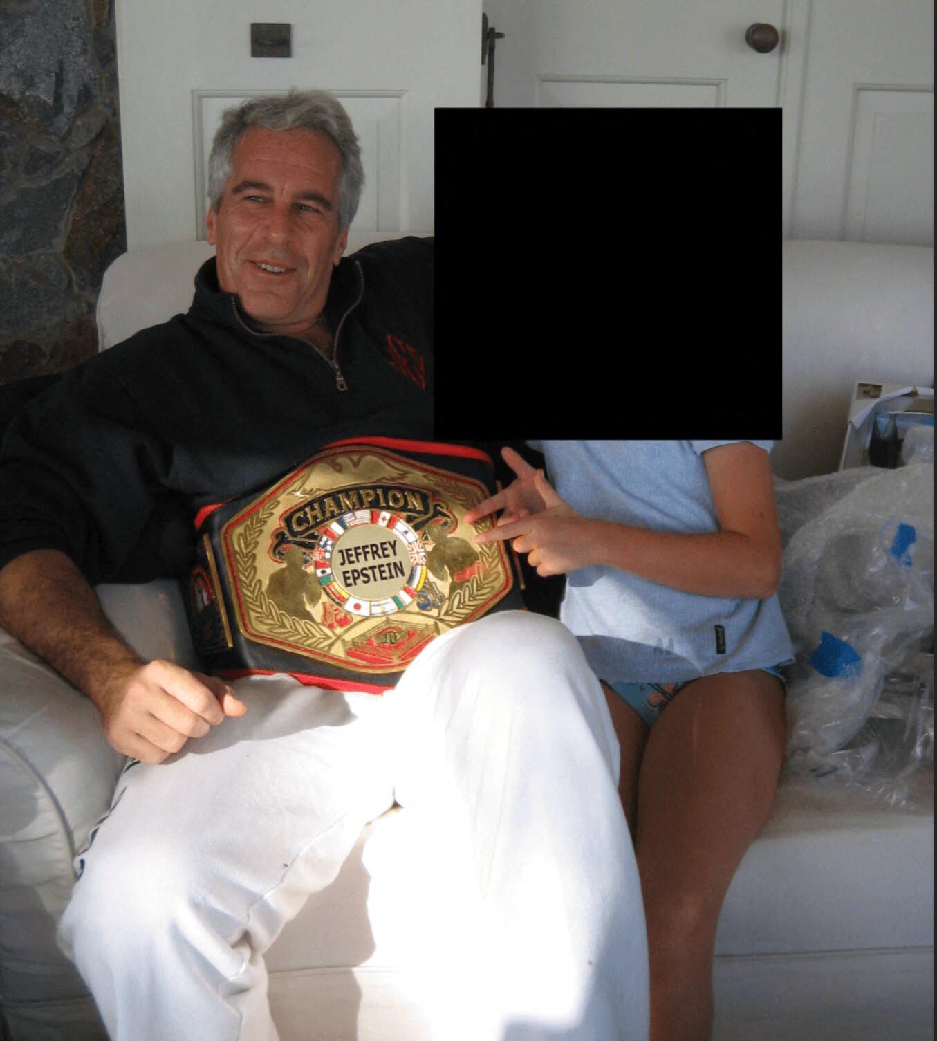 Jeffrey Epstein posing with a 'Champion' Belt with his name on it and with what appears to be a child in these undated photo released by the U.S. Department of Justice