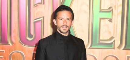 Jonathan Bailey wearing black