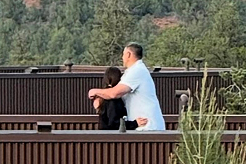New England Patriots’ Mike Vrabel and top NY Times NFL reporter Dianna Russini hold hands and hug at luxury hotel