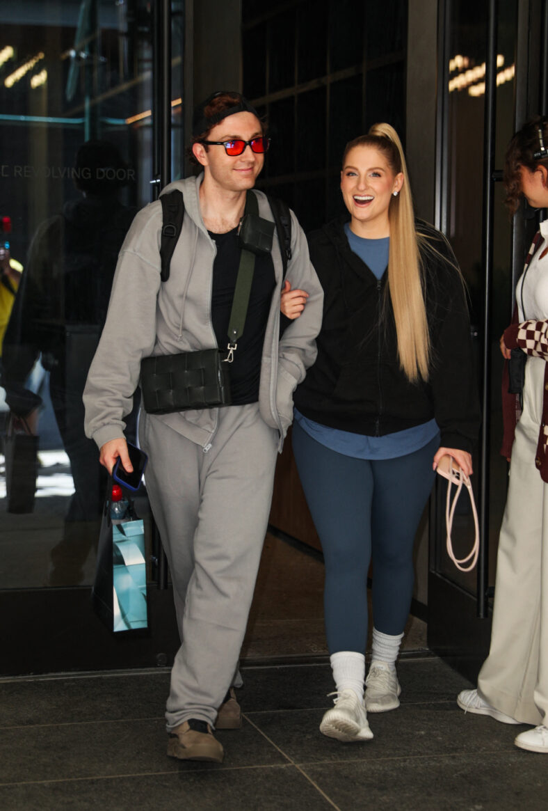 Meghan Trainor and her husband Daryl Sabara looked loved up smiling and walking arm in arm as they exit a taping of Watch What Happens Live this afternoon in New York City