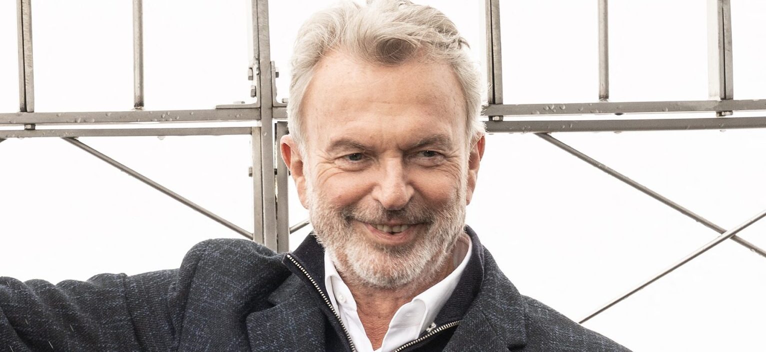 ‘Jurassic Park’ Star Sam Neill Now Fighting For Others After Beating Cancer