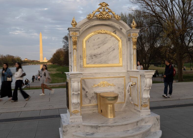 Golden toilet sculpture