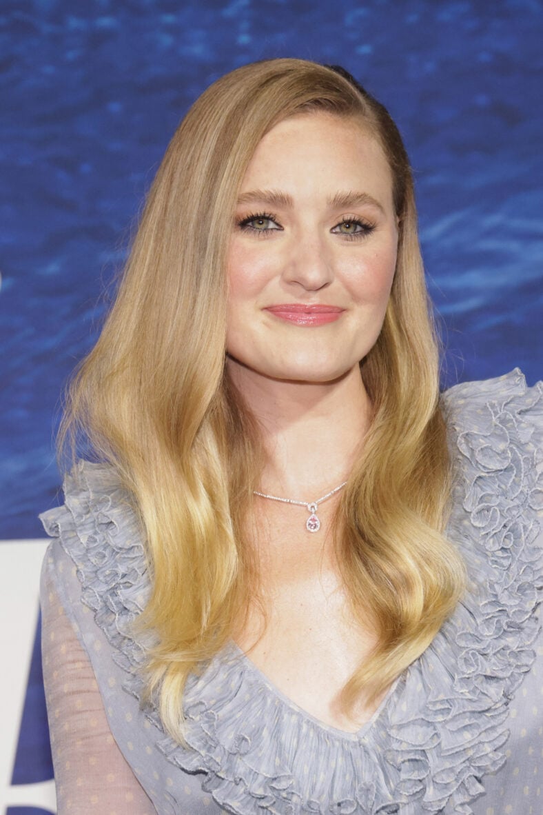 AJ Michalka posing on the red carpet. 