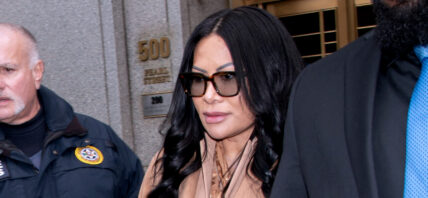 Jen Shah in brown coat and sunglasses.