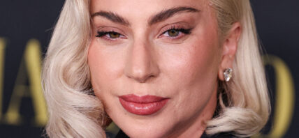 Lady Gaga wearing an Alexander McQueen suit arrives at the Los Angeles Special Screening Of Netflix's 'Maestro'