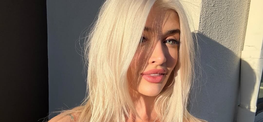 Sami Sheen Shows Off 'Massive Implants' In Plunging Swimsuit