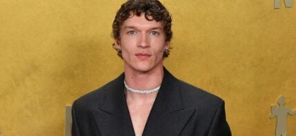 Connor Storrie in a suit