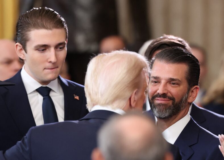 President Donald Trump with his sons, Donald Trump Jr. and Barron Trump at Inauguration ceremony for Trump's second presidential term