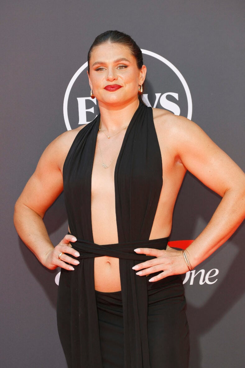 Ilona Maher posing on the red carpet. 