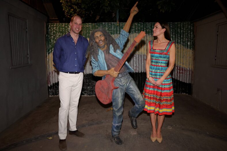 Prince William and Kate Middleton with a Bob Marley statue
