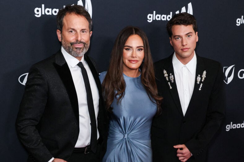 Brooks Marks posing with his mother, Meredith, and father, Seth.