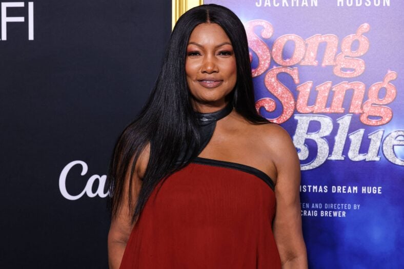 Garcelle Beauvais posing on the red carpet. 