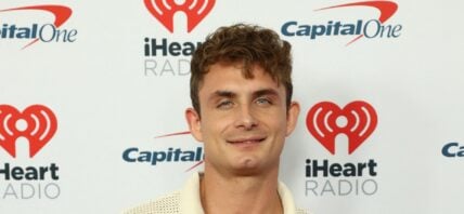 James Kennedy posing on the red carpet.