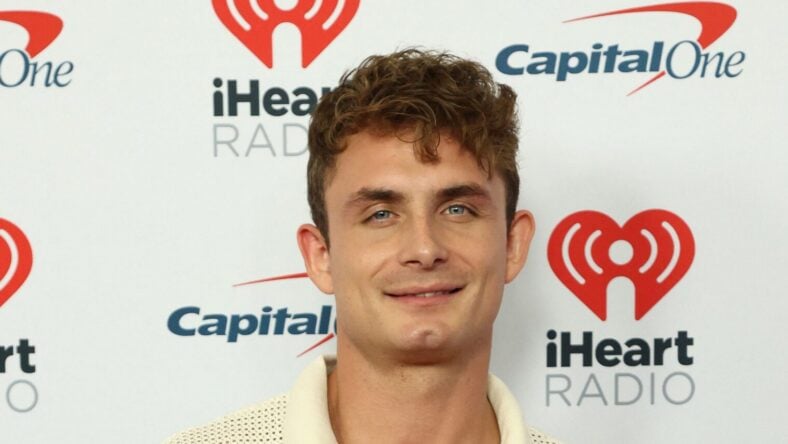 James Kennedy posing on the red carpet.