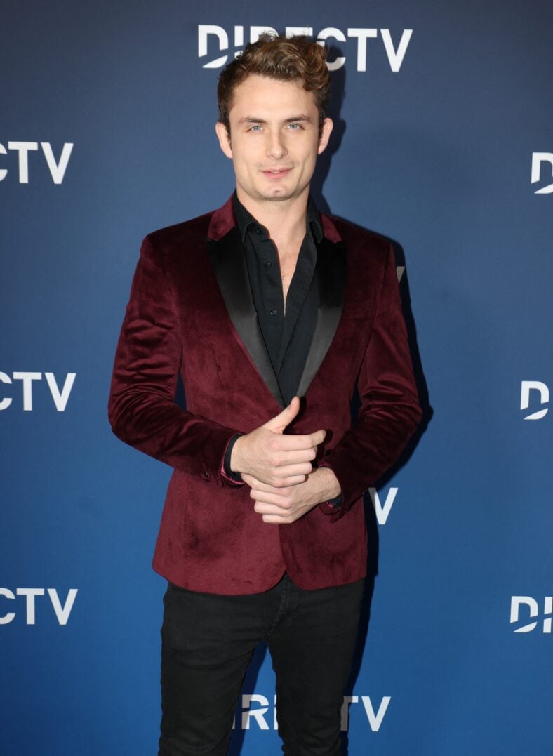 James Kennedy posing on the red carpet. 