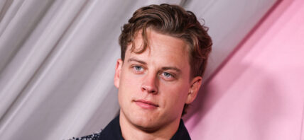 Joe Burrow posing on the red carpet.