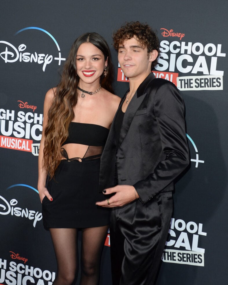 Joshua Bassett posing on the red carpet. 