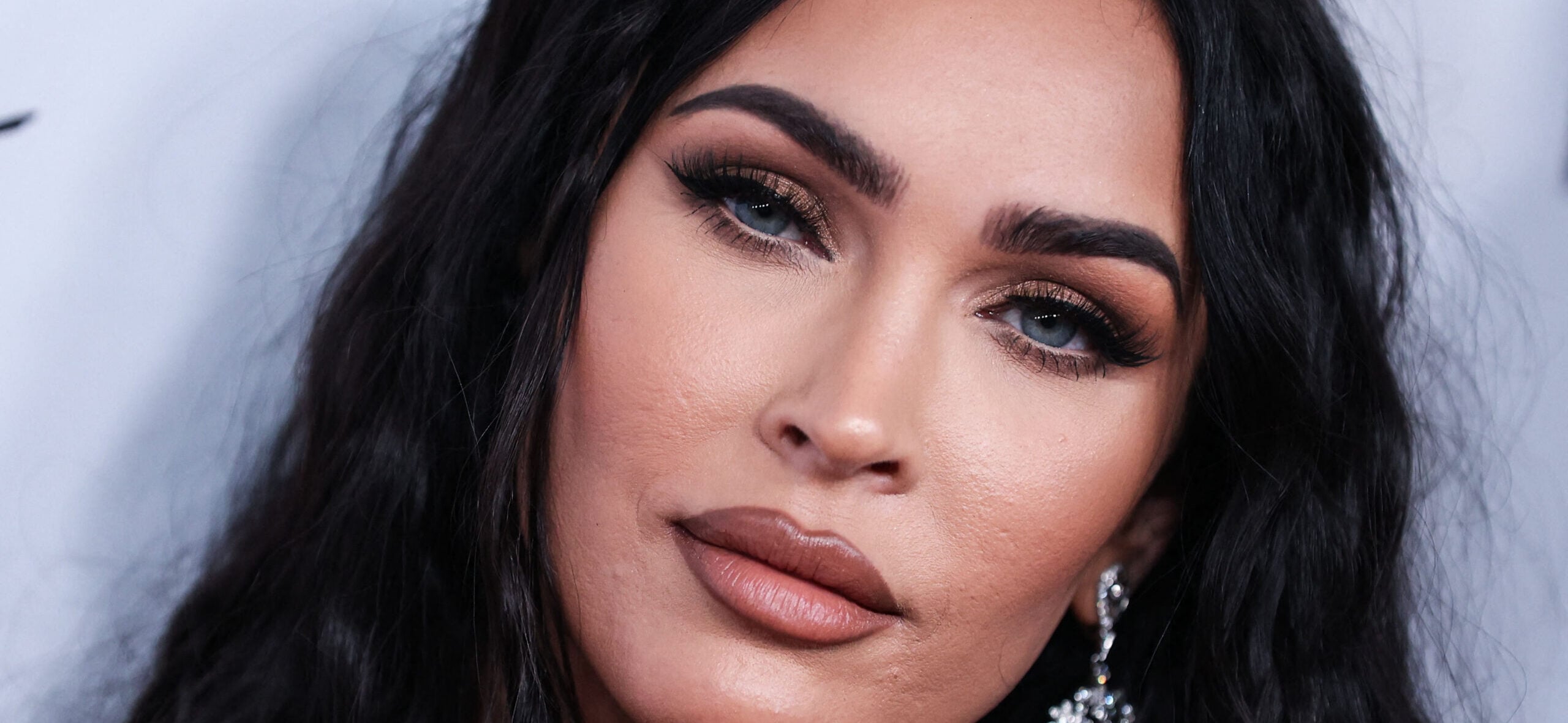 Megan Fox Stuns In Busty Black Outfit As Fans Call Her ‘Queen’