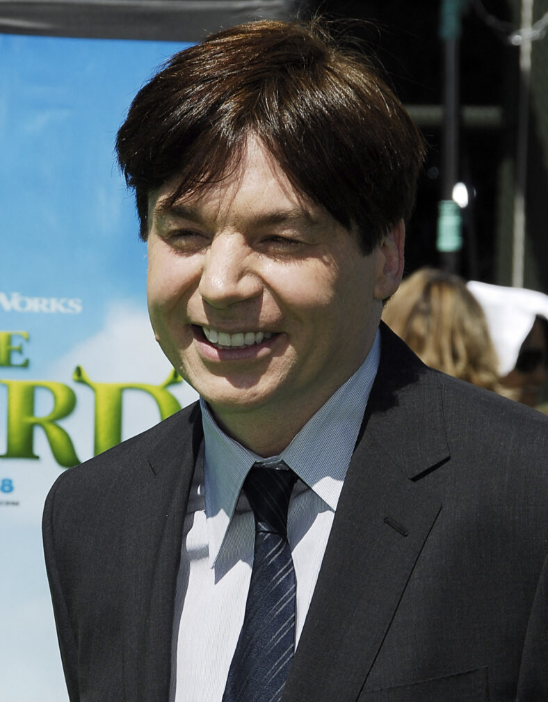 Mike Myers posing on the red carpet. 