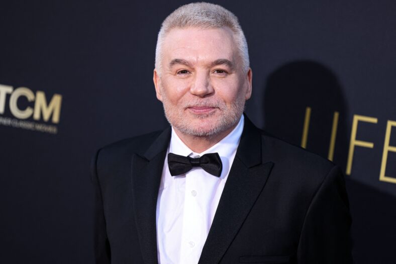 Mike Myers posing on the red carpet. 