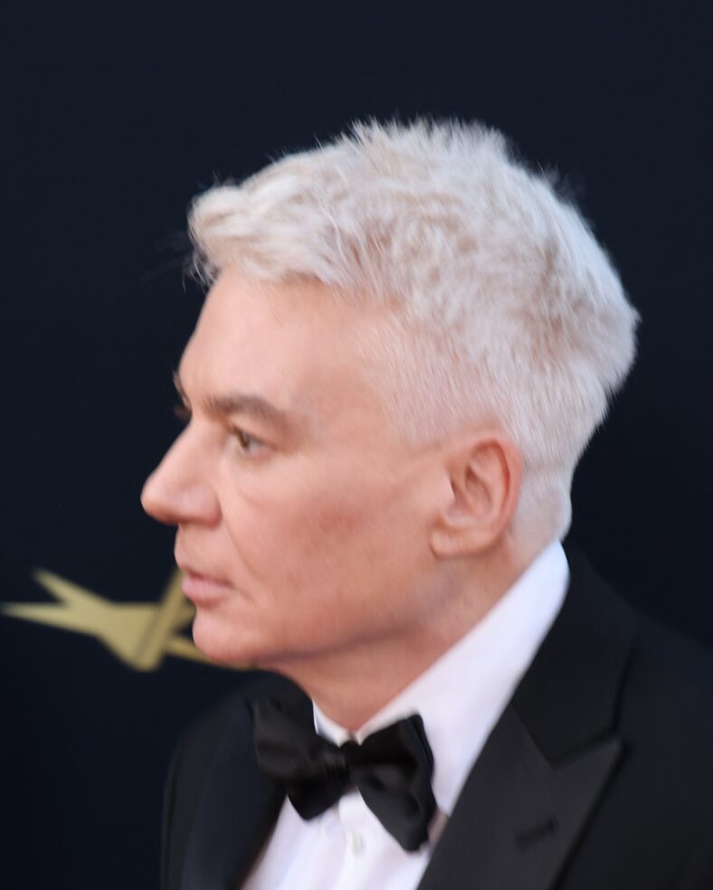 Mike Myers posing on the red carpet. 