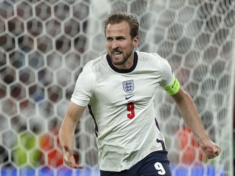 Harry Kane representing England's national team against Denmark
