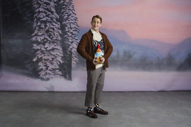 Macaulay Culkin poses in a socks advert.