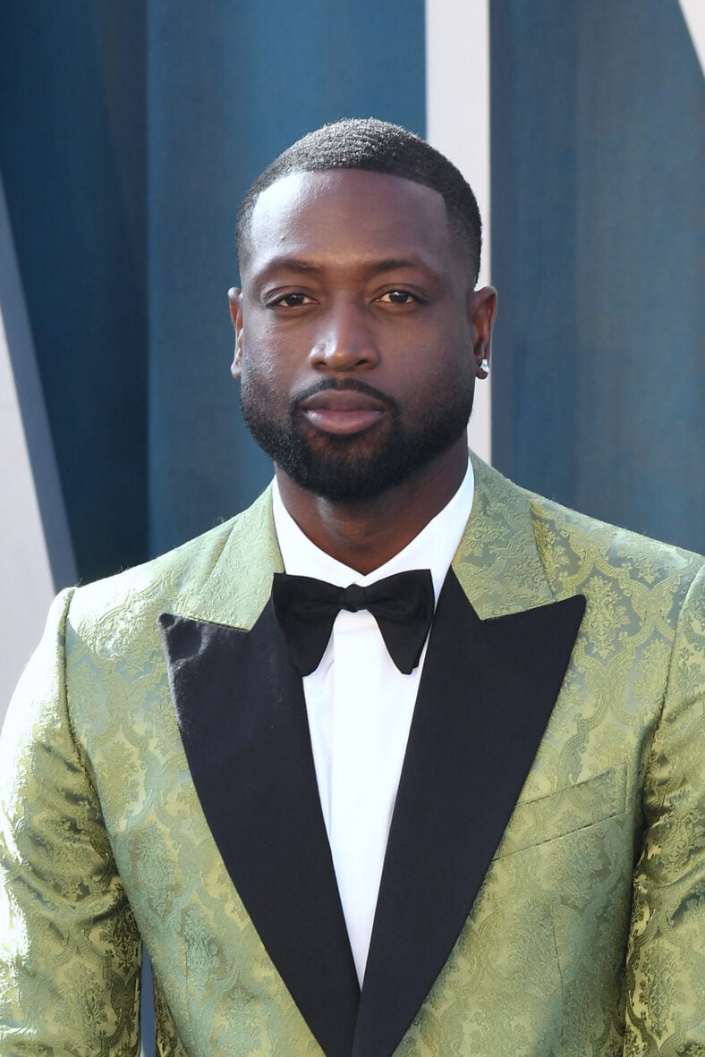 Dwayne Wade posing on the red carpet.