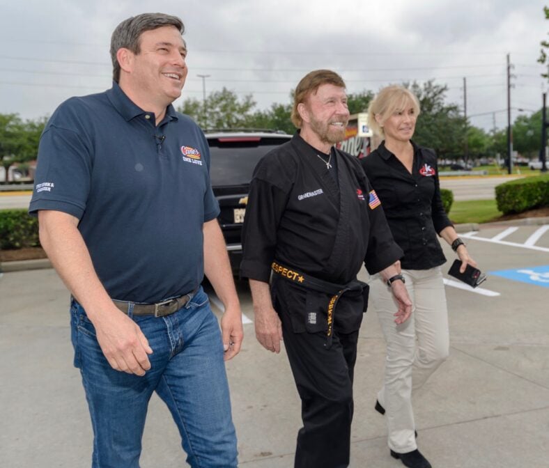 Todd Graves and Chuck Norris with his wife