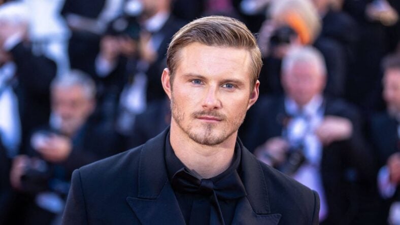 Alexander Ludwig Flaunts Inked Arms In Shirtless Pic: ‘Super Hot’
