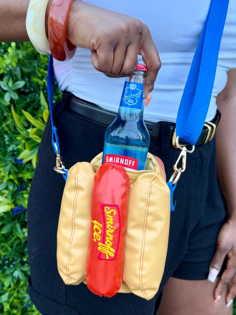 Smirnoff Ice inside a doggie bag