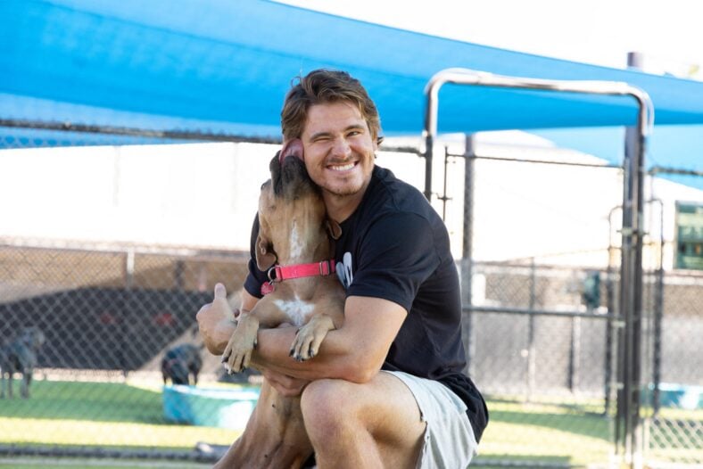 Justin Herbert and a dog