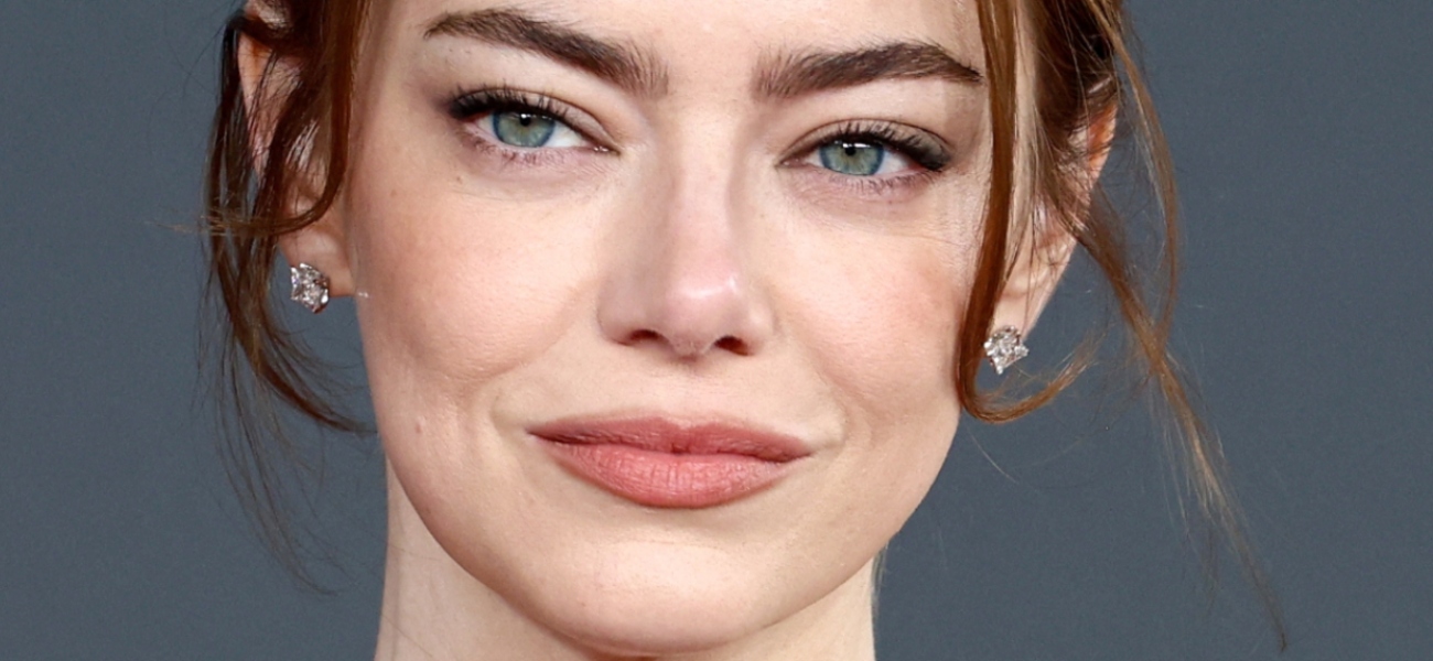 Emma Stone ‘Needs To Eat’ In Backless Dress While Going Braless