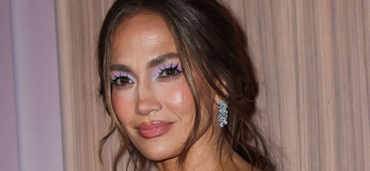 Jennifer Lopez Flaunts ‘New Twins’ In Low-Cut Feathered Dress