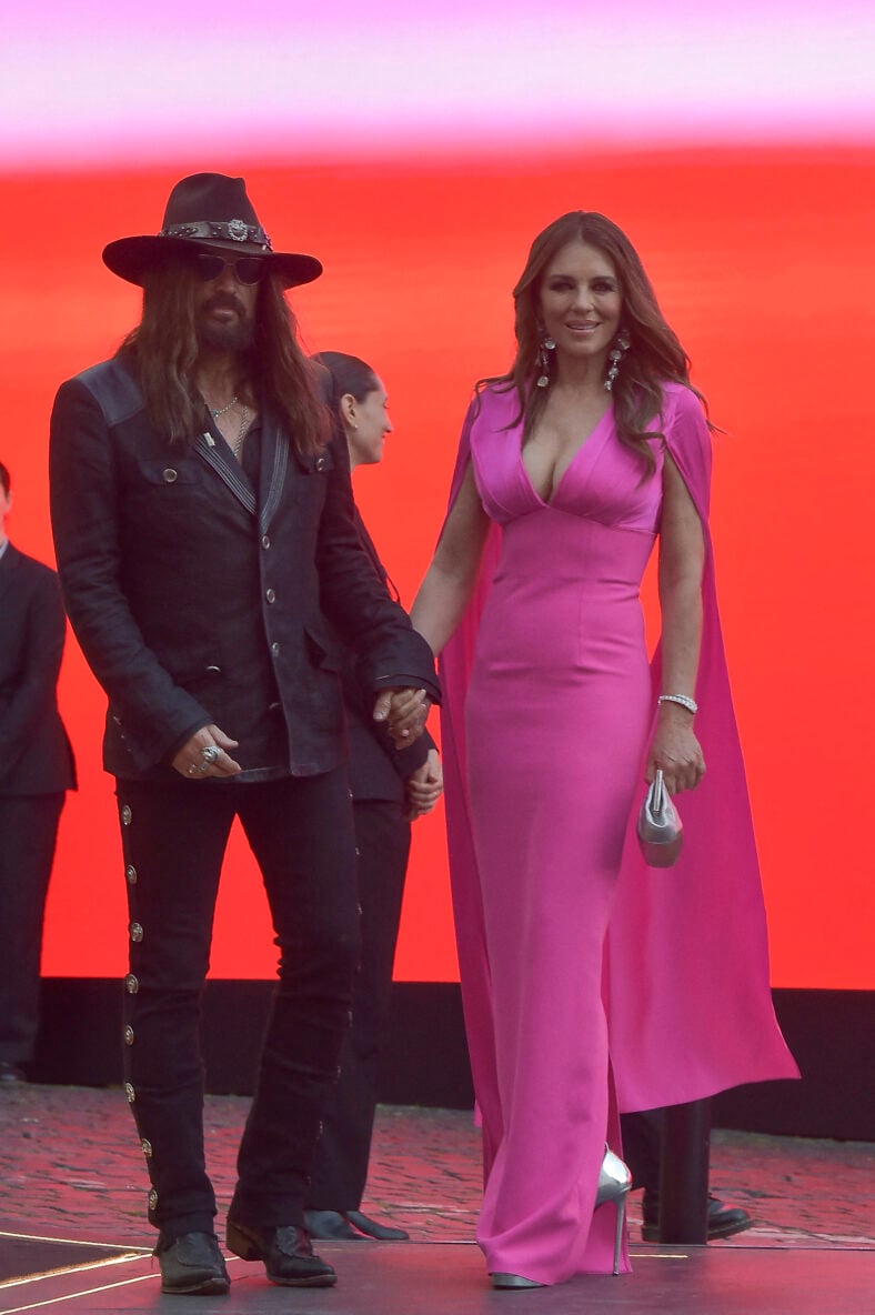Liz Hurley red carpet with Billy Ray Cyrus and her son Damien in Rome