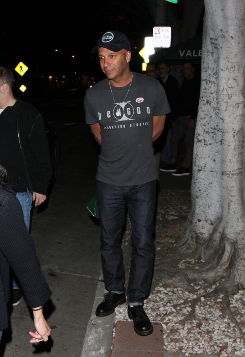 Musician Tom Morello leaves Madeo restaurant in his muscle car while wearing a 'I Voted' sticker