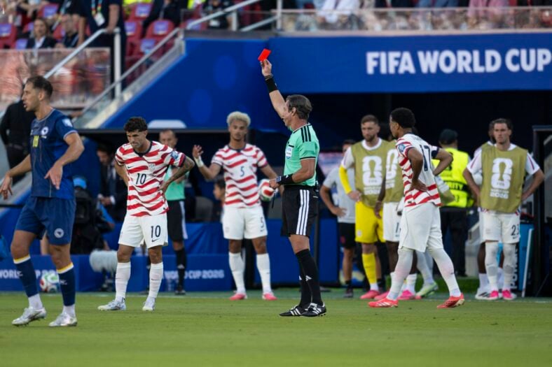 Referee shows a red card