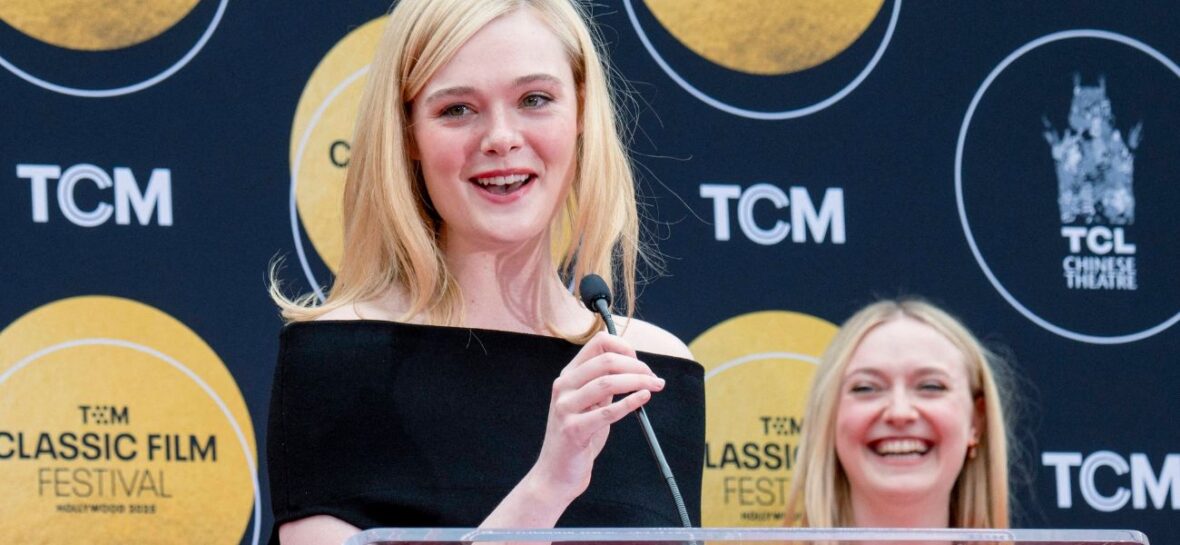 Elle Fanning speaking while Dakota Fanning watches
