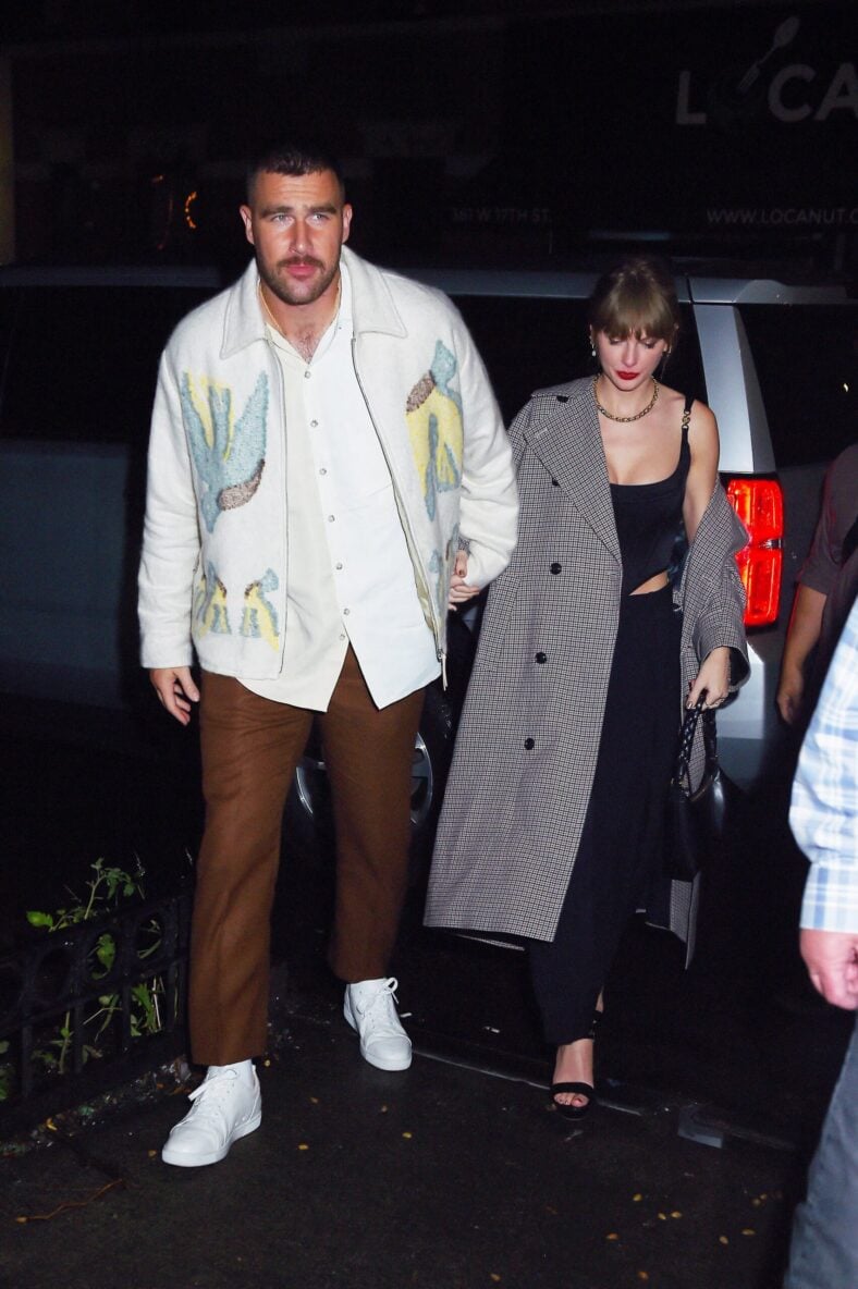 Taylor Swift and Travis Kelce hold hands as they arrive to the snl after party