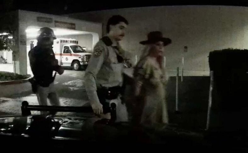 Britney Spears is seen being placed in Handcuff after cops pulling over the pop princess for allegedly speeding and swerving across lanes near the Los Angeles-Ventura County border