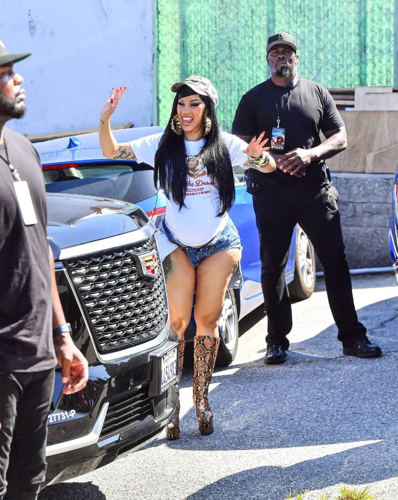 Cardi B Is Looks Stylishly Fabulous As She Waves At Fans Before A Meet & Greet In Long Beach, CA.