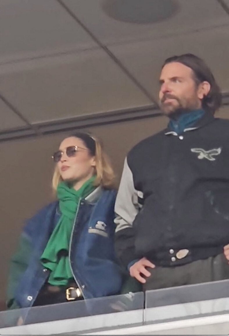 Ecstatic Bradley Cooper and Gigi Hadid celebrate a Philadelphia Eagles touchdown in their January 19 NFL playoff game