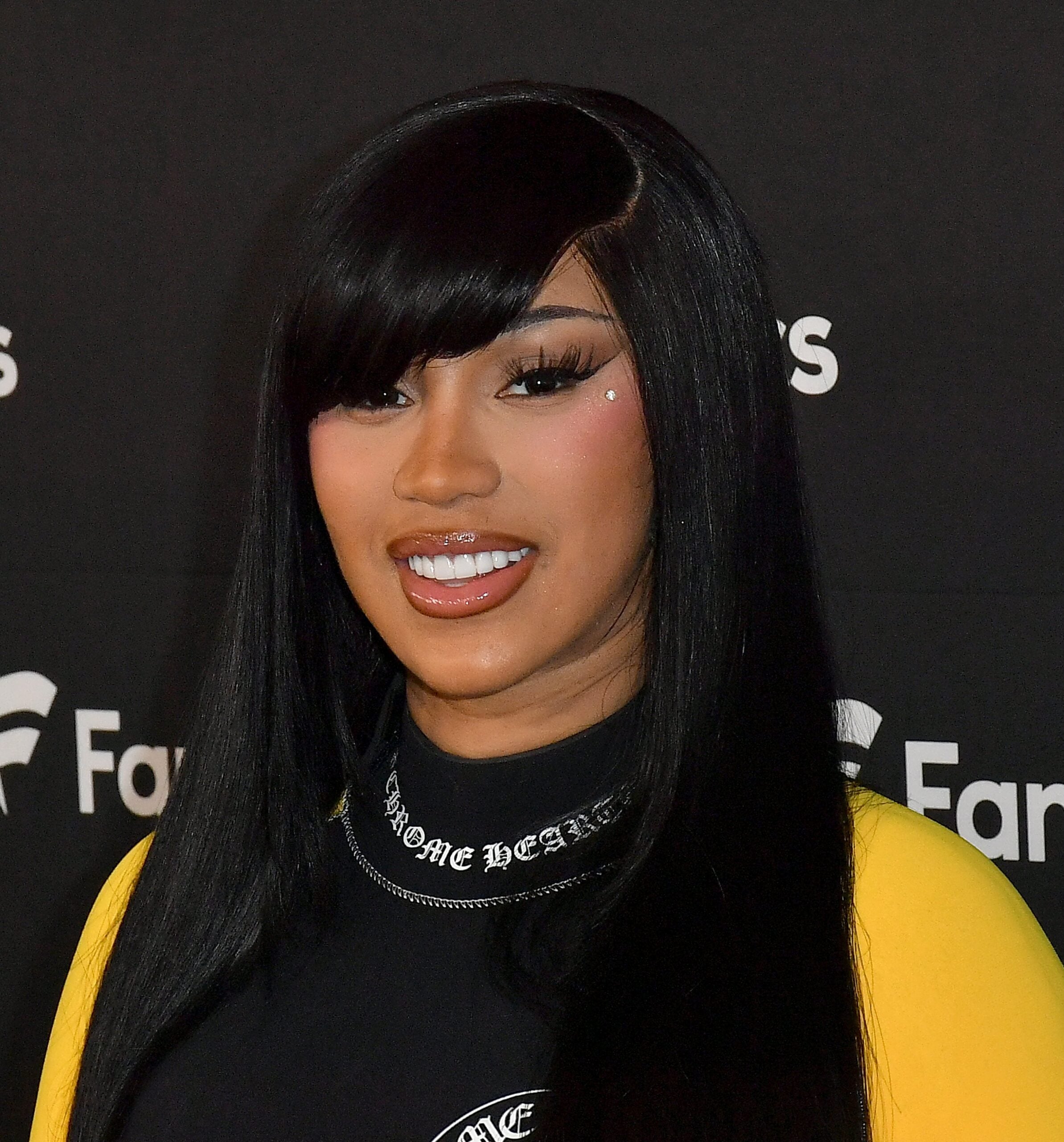 Cardi B Struts In Versace At Vogue World, Told She ‘Looks A Mess’