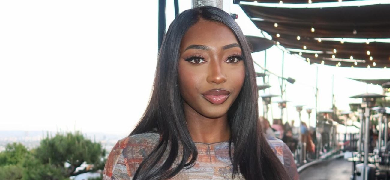 Aniya Harvey’s Abs Peek Out In Tight Dress, Fans Are Gagged