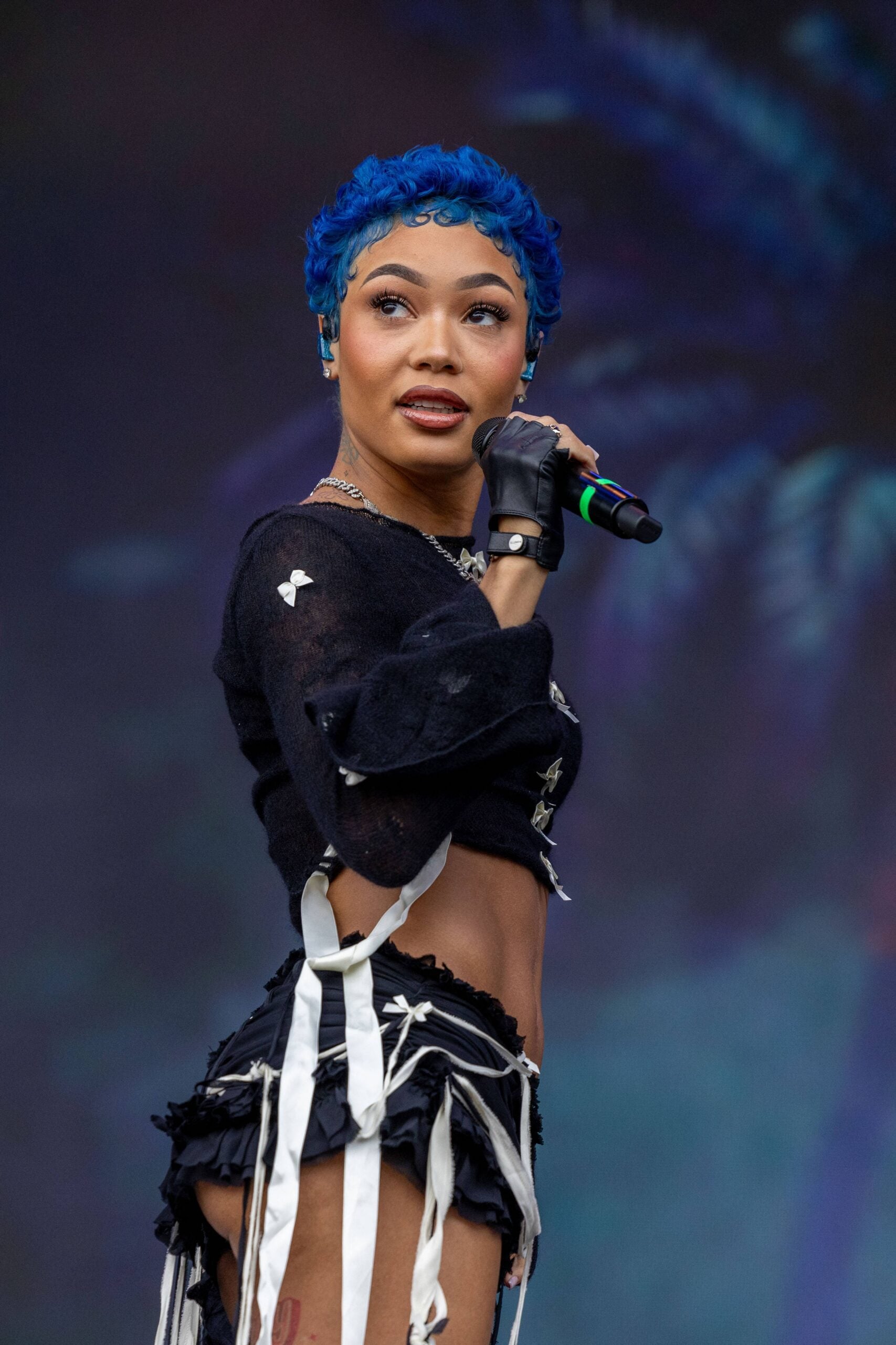 Coi Leray Exposes Chest In ‘Tacky’ Cutout Bodysuit At NYFW