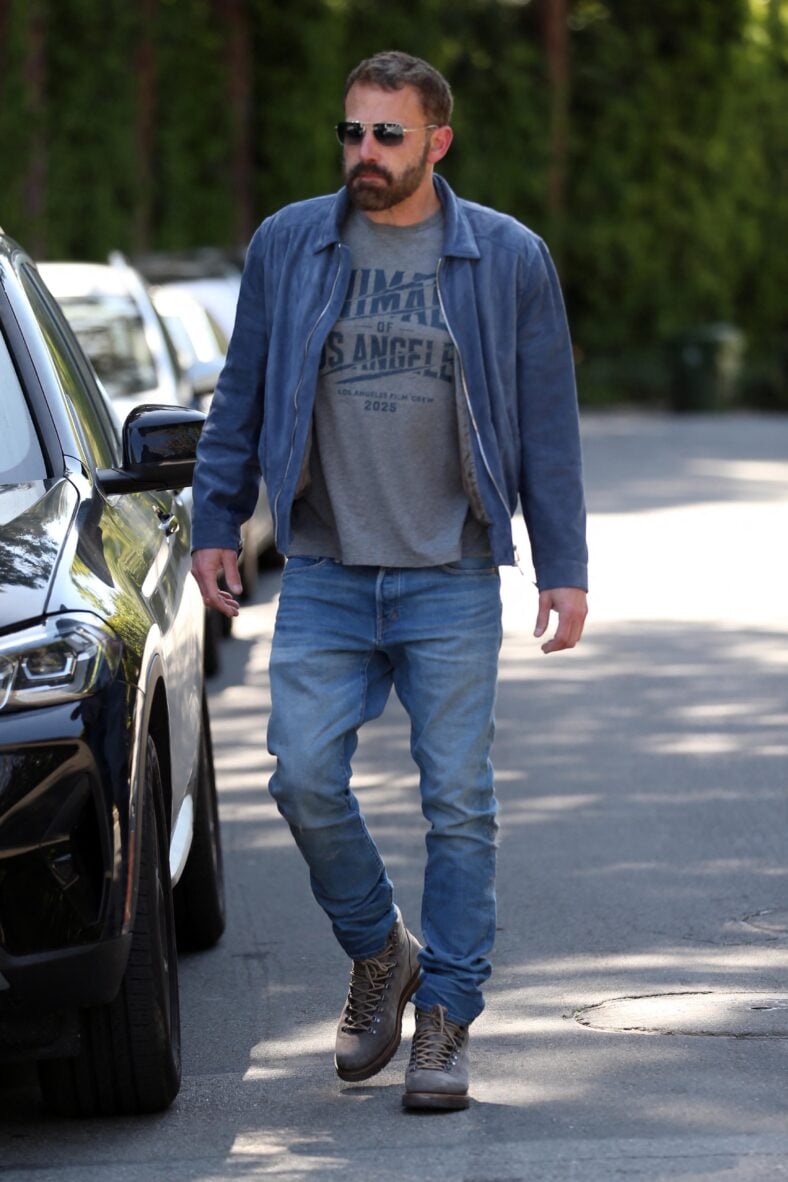 Ben Affleck smokes a cigarette while scouting locations for an upcoming movie.