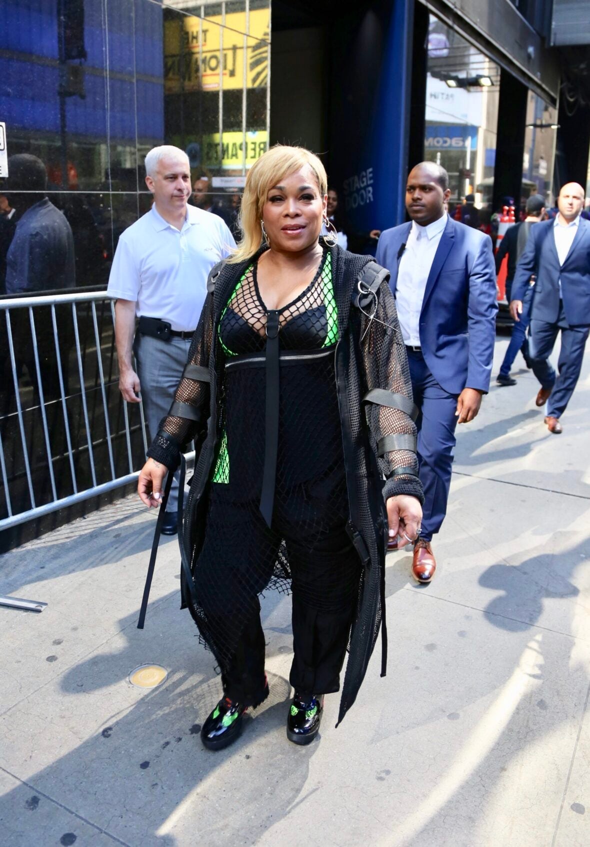 TLCs Tionne "T-Boz" Watkins and Rozonda "Chilli" Thomas are seen leaving Good Morning America.