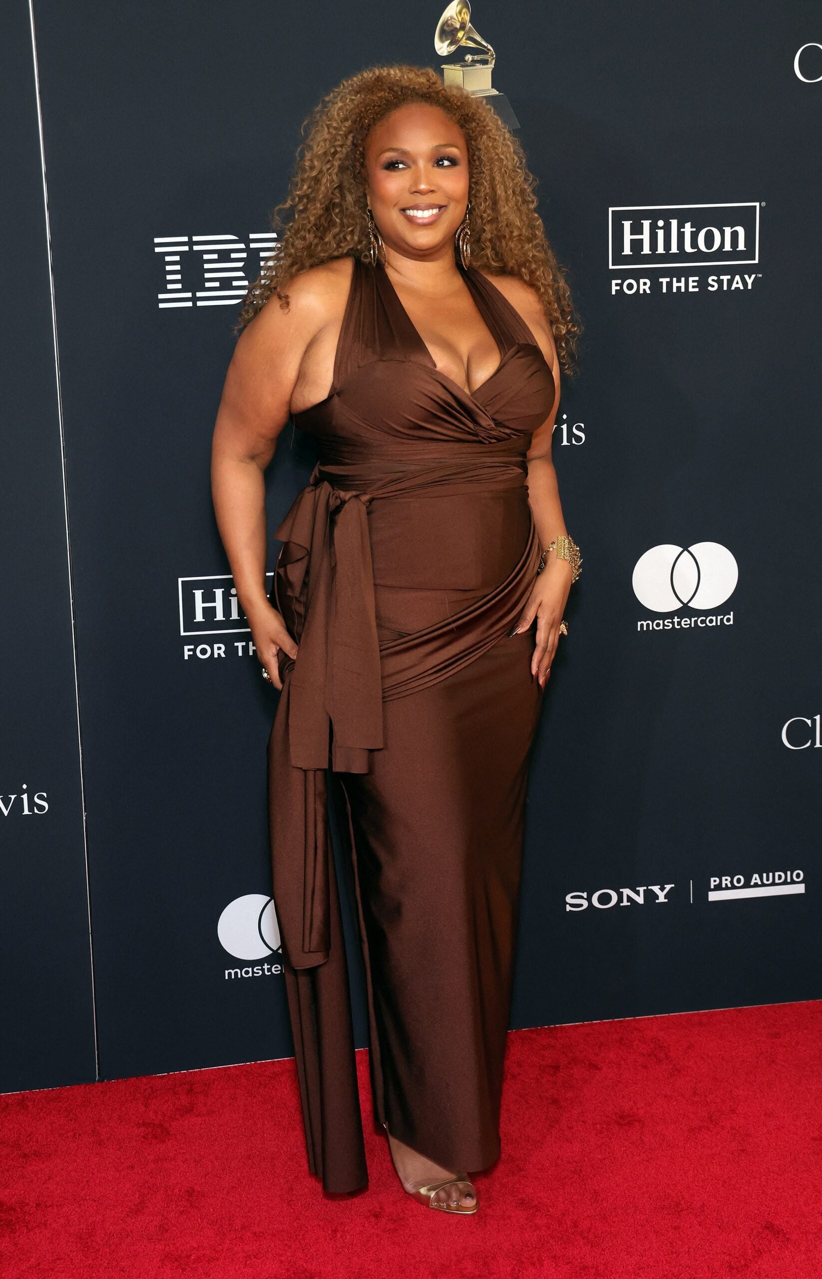 Lizzo In Skimpy Shorts Has Fans Wanting A ‘Taste Of The Rainbow’